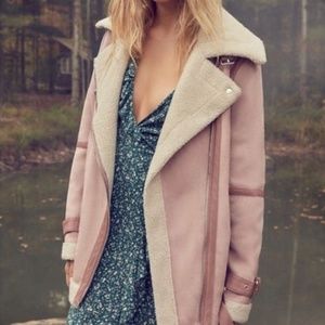 Pink oversized shearling moto jacket